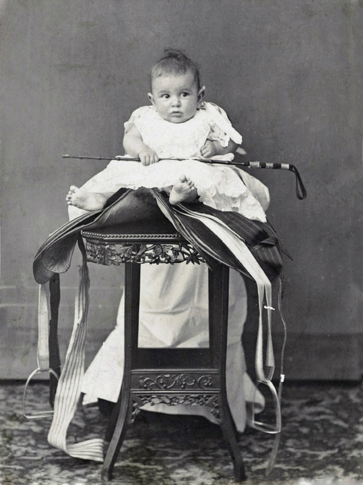 John Lee Guinness Oswald, posed on a saddle, c.1908, Foochow (Fuzhou), Oswald collection, Os05-112.