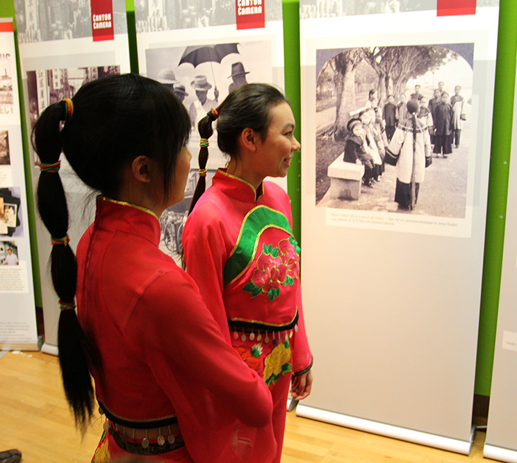 Dancers looking at Canton Camera, during Chinese New Year events, Bristol Museum and Art Gallery, 2013.  Photograph by Jamie Carstairs.
