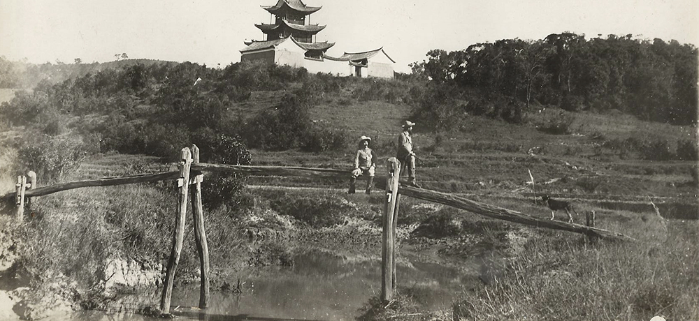 Bridge and Shen Lo (Water Pavilion), Szemao. Note the two Europeans on the bridge and how their distinctive clothing will have conveyed their ‘otherness’ to the local people. According to Carey, ‘all foreigners travelling in these regions are treated as officials’. Frederic Carey Collection, FC01-13 © 2011 Ann Kinross.