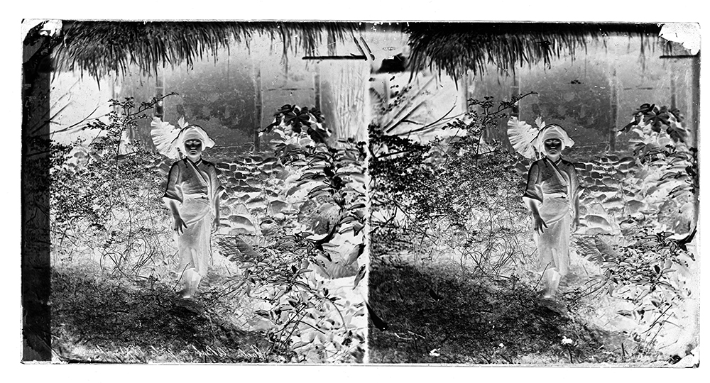 A scan of Thomson’s stereoscopic negative numbered 770. 'Gochi, a Baksa girl 1871'. Credit: Wellcome Collection. CC BY.