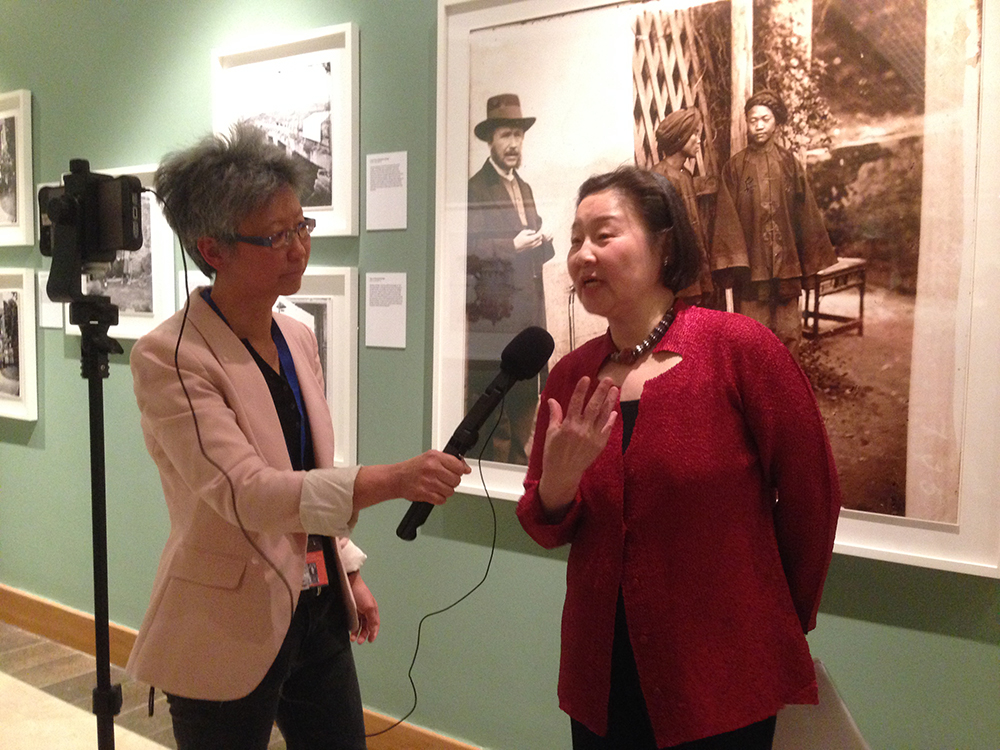 Yang-May Ooi interviewing Betty Yao at the exhibition 'China and Siam Through the Lens of John Thomson', at the Brunei Gallery, SOAS, University of London. Photograph by Jamie Carstairs.