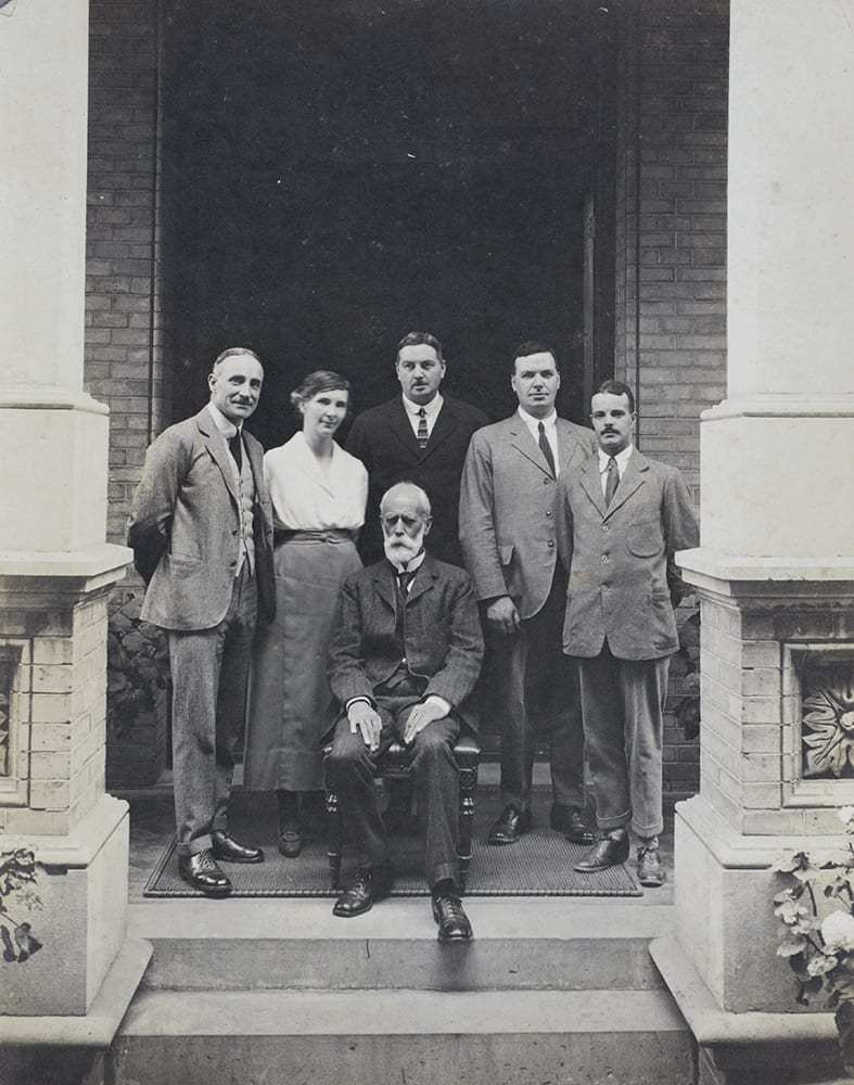 Senior bank staff, including Guy Hillier and R.C. Allen, Hongkong and Shanghai Bank, Beijing, c.1923. Standing, from left to right: R.C. Allen (Accountant), Eleanor Hillier, unidentified man (but not Hubbard), D. A. Johnston, name unconfirmed (possibly J.L.T. Patch). Sitting: Guy Hillier. Guy and Ella were married in Hong Kong on 20 December 1919. Richard Family Collection, Historical Photographs of China ref EH-s63.