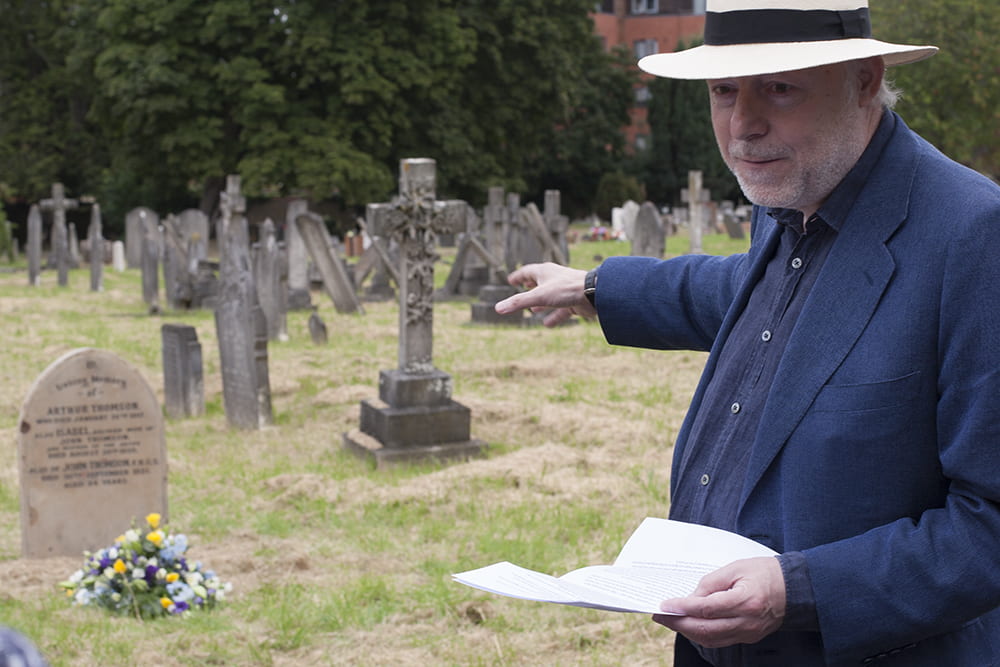 Terry Bennett describing how he found the site of John Thomson’s grave in Streatham Cemetery. Photograph by Jamie Carstairs.