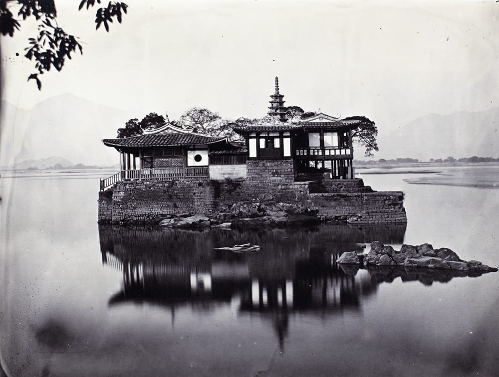 'Little' Jinshan temple (金山塔寺), Wulong River, Fuzhou, c1869. The 'Little Jin Shan' is a pagoda and temple on a small island located in the middle of the Wulong River, which is a branch of the Min River, near the village of Hongtong in the western suburb of the city of Fuzhou in Fujian Province. It resembles the famous Jin Shan (Gold Mountain or Golden Hill) Temple (金山寺) in in Jiangsu Province. Unidentified photographer - perhaps Lai Fong (Afong Studio)? HPC ref: Fr01-002.