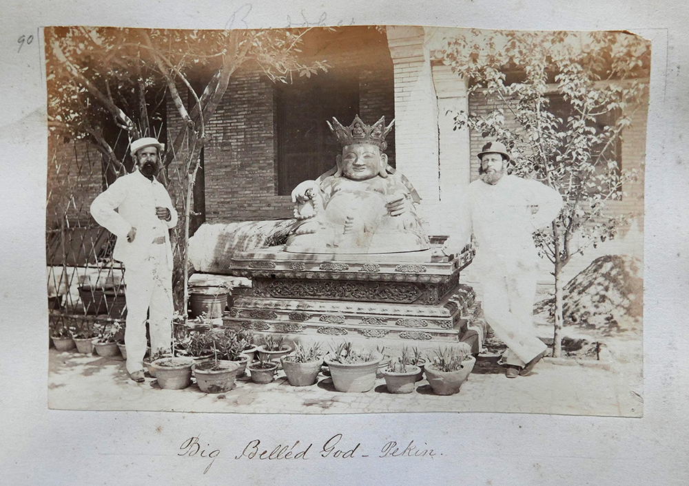 Fig. 2. This faded print of a photograph by Charles Frederick Moore, is pasted into his album at the Irish Jesuit Archive and captioned ‘Big Bell’ed God, Pekin’. Other known prints are labelled ‘The Bronze Joss Ta tu tza, Peking’ (i.e. The bronze, big-bellied god, Beijing) and ‘Bronze Idol’. Reference image courtesy of the Irish Jesuit Archive, Dublin.